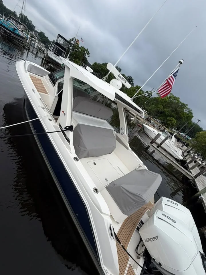 Stern quarter and outboard at the dock